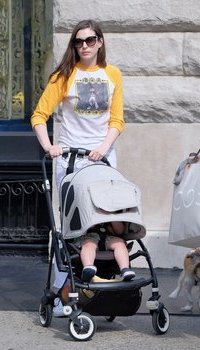 Anne Hathaway walking with their child in SOHO