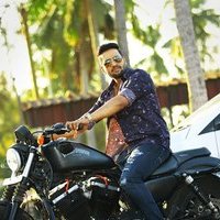 Santhanam - Santhanam With Harley Davidson From Sakka Podu Podu Raja Movie Stills | Picture 1479805
